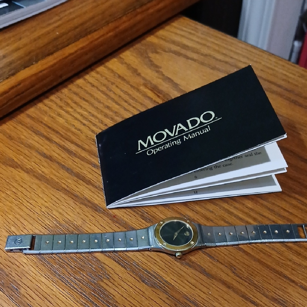 Movado Black and Gold  vintage( sports edition) non running 6.5 wrist.